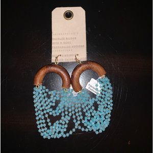 Never worn Anthropologie wooden and beaded earrings.